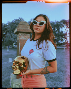 The High Priest shirt also features our Coven logo, El Diablo, resting upon our Coven's name. Sister Witch Madisun holding the golden skull we use in ritual. - Adrian Maciel
